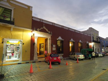 SAN FRANCISCO de CAMPECHE, MEXICO on FEBRUARY 2018: Street view with yellow colonial buildings in mexican city with cloudy sky in warm day at evening, North America.