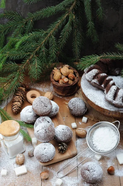 Chocolate muffin with sugar powder and holiday decorations
