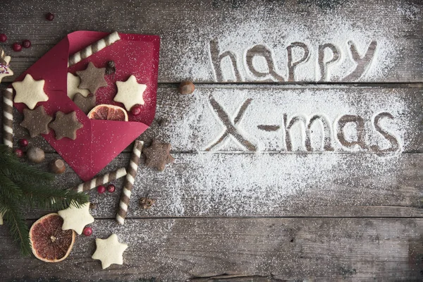 Buon Natale - iscrizione, biscotti e decorazione — Foto Stock