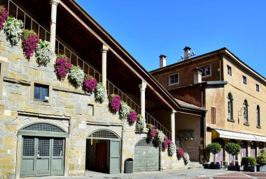 Town hall with stairs and columns, decorated with red and white 