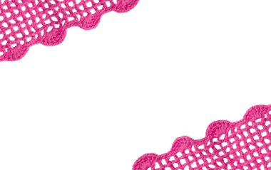 Beyaz arka planda elle işlenmiş pembe dantel..