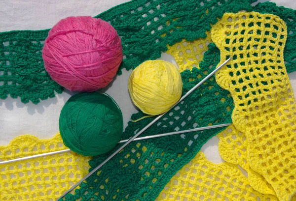 Handicraft kit. Threads in bundles of different colors for knitting.