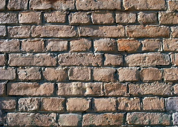 Un ladrillo viejo. Muro de ladrillo viejo, fragmento —  Fotos de Stock