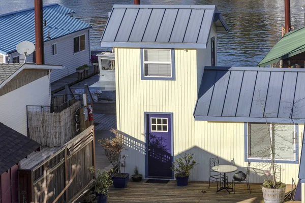 Purple door and small floating home. — Stock Photo, Image