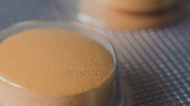 Medical pills placed on rotating table, shot with white seamless background — Stock Video