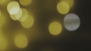 Altın, bulanık, bokeh arka ışıklar. soyut parıldıyor. Tam HD 1080 p, döngü
