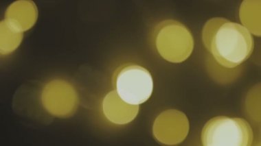 Altın, bulanık, bokeh arka ışıklar. soyut parıldıyor. Tam HD 1080 p, döngü