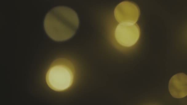 Fondo dorado, borroso, con luces bokeh. Los destellos abstractos. Bucle Full HD, 1080p — Vídeos de Stock