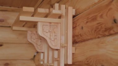 Beautiful carved wooden coat hanger.