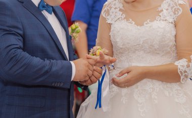 Beautiful newlyweds at the solemn registration of marriage.