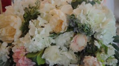 Beautiful multi-colored bouquet of flowers in a festive packaging.