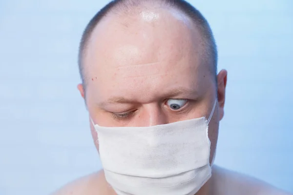 Portrait of a bald man who is in a medical mask. — Stock Photo, Image
