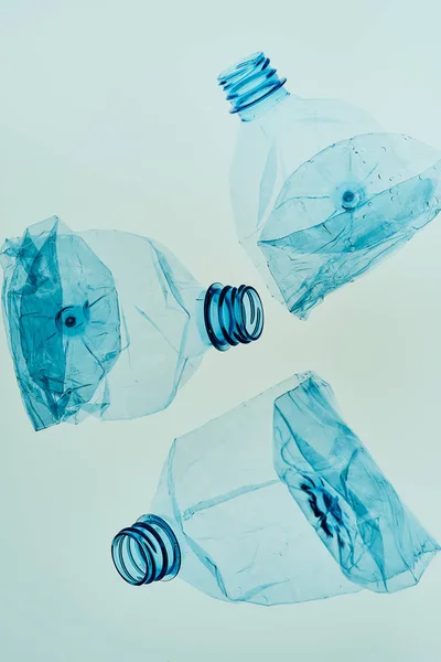 Empty plastic squashed bottles collected to recycling — Stock Photo, Image
