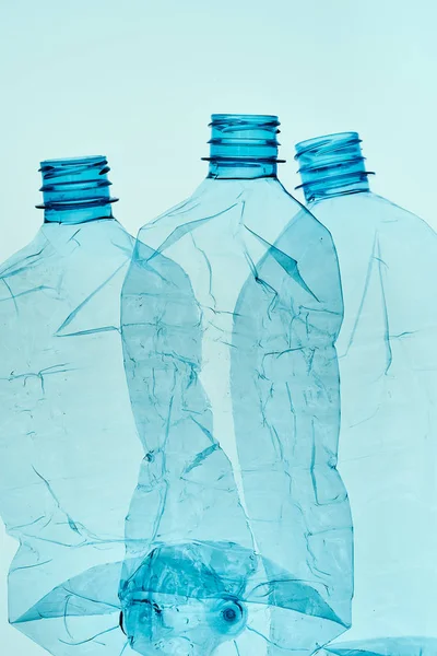 Empty plastic squashed bottles collected to recycling — Stock Photo, Image