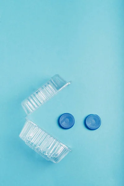 Plastic packaging and bottle caps collected to recycling