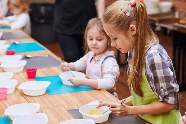 Little Girls Stirring Yolk Sugar Kids Taking Part Baking Workshop Royalty Free Stock Photos