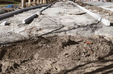 Avrupa Caddesi 'ndeki yol onarımı Dünya' nın kum betonu 