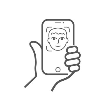 El akıllı telefonu tutar ve selfie çeker. Akıllı telefondaki fotoğraf. Düzenlenebilir Vuruş