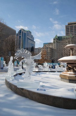 Crow eagle ice sculpture at Ottawa's Winterlude Ottawa Feb 8, 2017 clipart