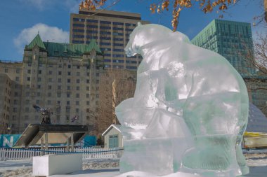 Polar Bear Ice Sculpture Carving at Winterlude, Ottawa, Feb 8, 2017 clipart