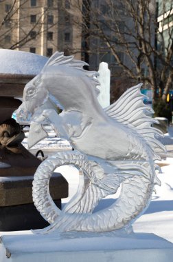 Seahorse Ice Sculpture Carving at Winterlude, Ottawa, Feb 8, 2017 clipart