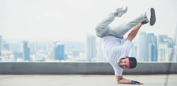 Street artist breakdancing outdoors