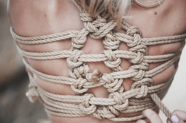 Woman bound with a rope in Japanese technique shibari — Stock Photo, Image