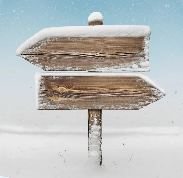 Wooden direction sign with snow and snowfall bg. two_arrows-oppo