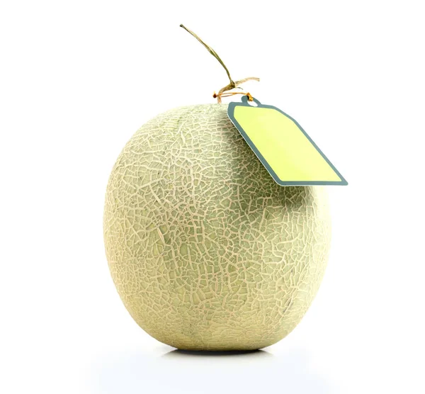 Melon with green label tag — Stock Photo, Image