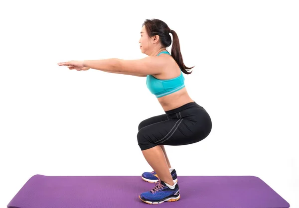 Gordinha mulher fazendo fitness — Fotografia de Stock