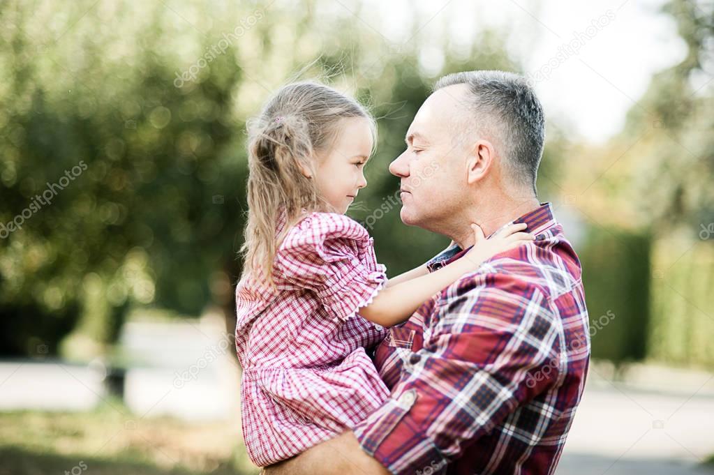 grandfather with granddaughter