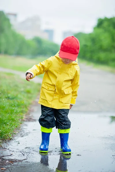 Little Boy Raincoat Rubber Boots Playing Puddle — Stock Photo, Image