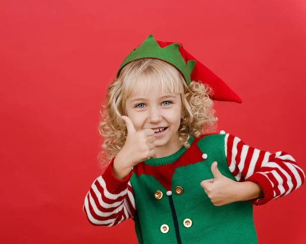 Boldog Karácsonyt Gyermek Mutatja Hüvelykujját Fel Mint Santa Elf Segítő — Stock Fotó