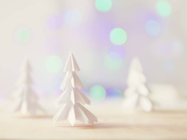 Kağıt origami ağaçları ve güzel bokeh parlamayı çelenk ile Noel ve yeni yıl arka plan.