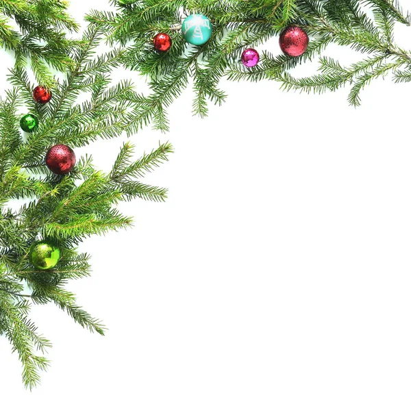 带圣诞装饰球的冷杉树枝框架 — 图库照片