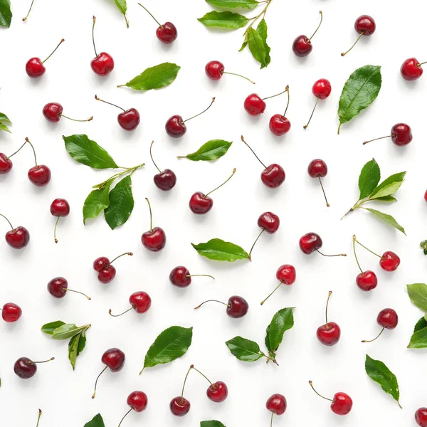 Food composition with berries and leaves isolated on white background