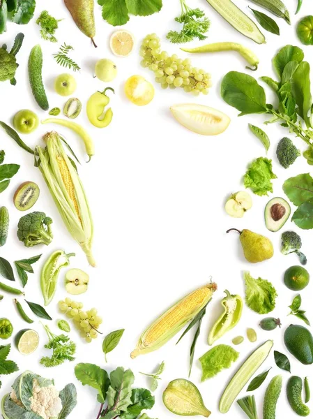 Food texture. Seamless pattern of various fresh yellow and green vegetables and fruits isolated on white background, top view, flat lay. Composition of food.