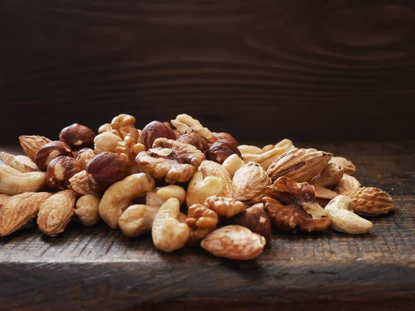 Different Nuts Wooden Board Close — Stock Photo, Image