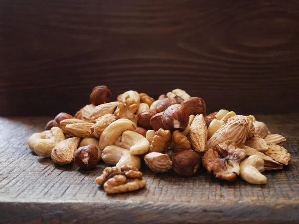 Different Nuts Wooden Board Close — Stock Photo, Image