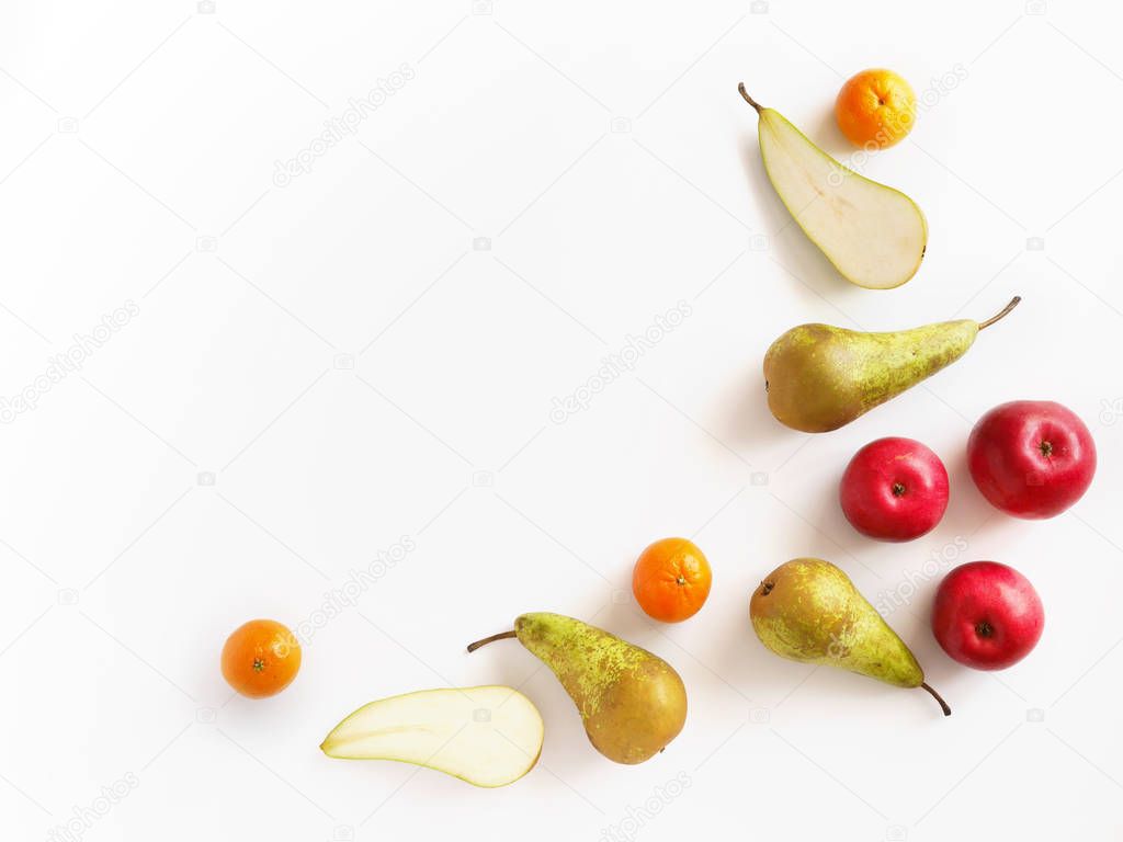 Various fruits: pears, apples, tangerines isolated on white background, top view, flat layout. Composition of various fruits with copy space.