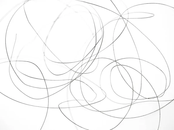 黒ロープ白で隔離のクローズ アップ 抽象化の背景 — ストック写真