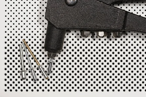 Detail nýtu zbraň - ruční Nýtovačka — Stock fotografie