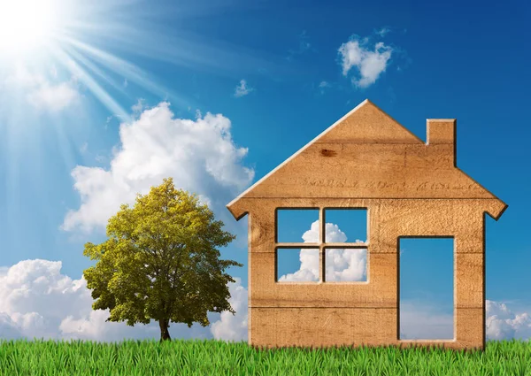 Yeşil çimenlerin üzerinde ahşap ev