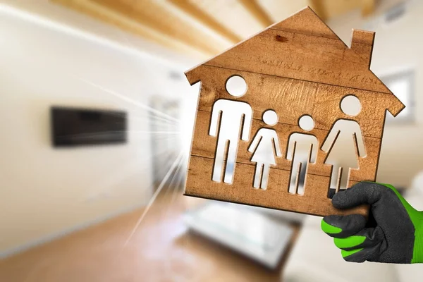 Inredningskoncept - modell hus med familj — Stockfoto
