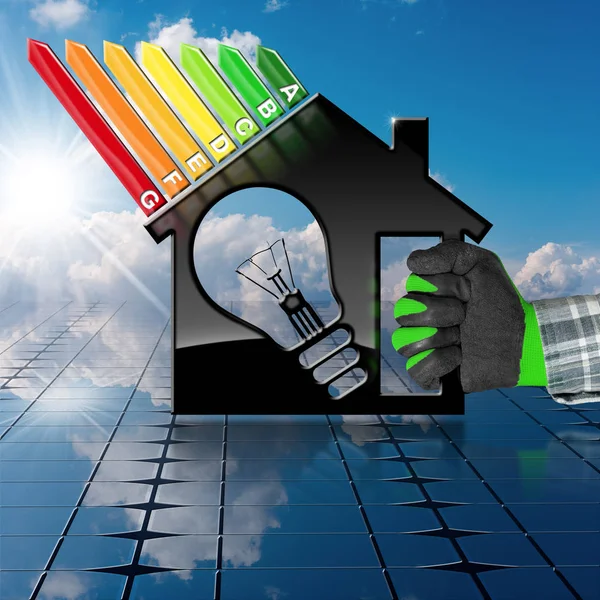 Eficiencia energética - Casa en un panel solar — Foto de Stock