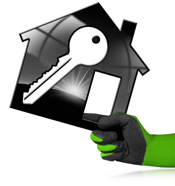 Modèle de maison avec clé dans une main gantée — Photo