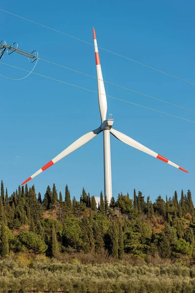 Wind Turbine and a Power Line — Stock Photo, Image