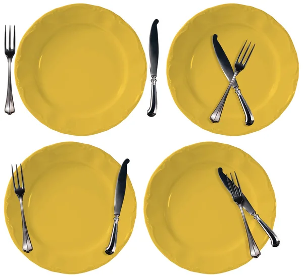 Collection of Yellow empty plates with fork and knife - Isolated — Stock Photo, Image