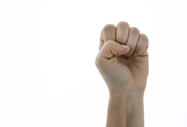 Pugno di mano sollevata su sfondo bianco — Foto Stock