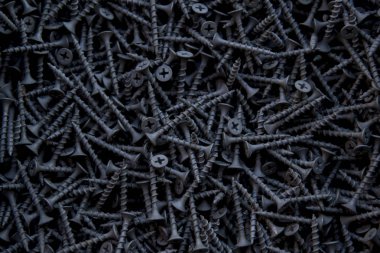 Arka plan siyah kısa vidalar